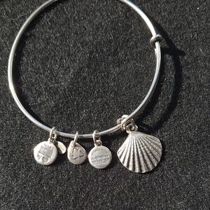 Silver Charm Bracelet with Shell and Coin Charms